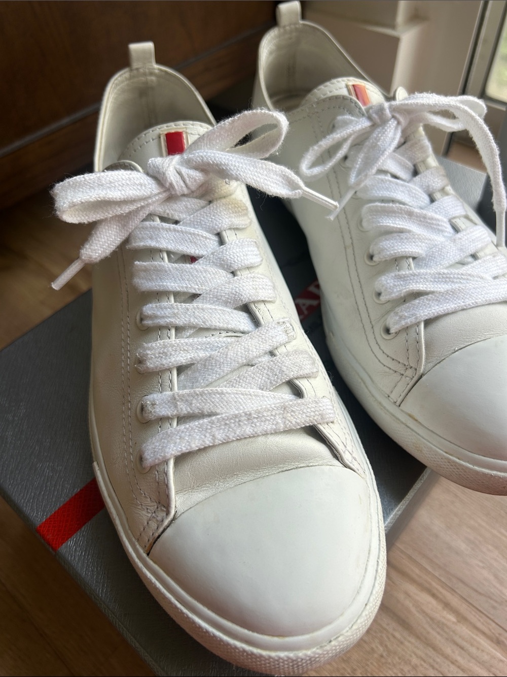 Prada White Leather Sneakers with Red Logo Detail - Picture 2 of 13